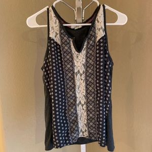Super cute tank top with pattern and lace